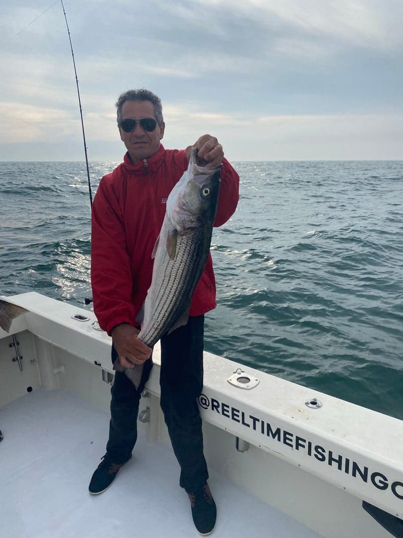 Striped Bass caught by Reel time fishing cape cod, July 2025